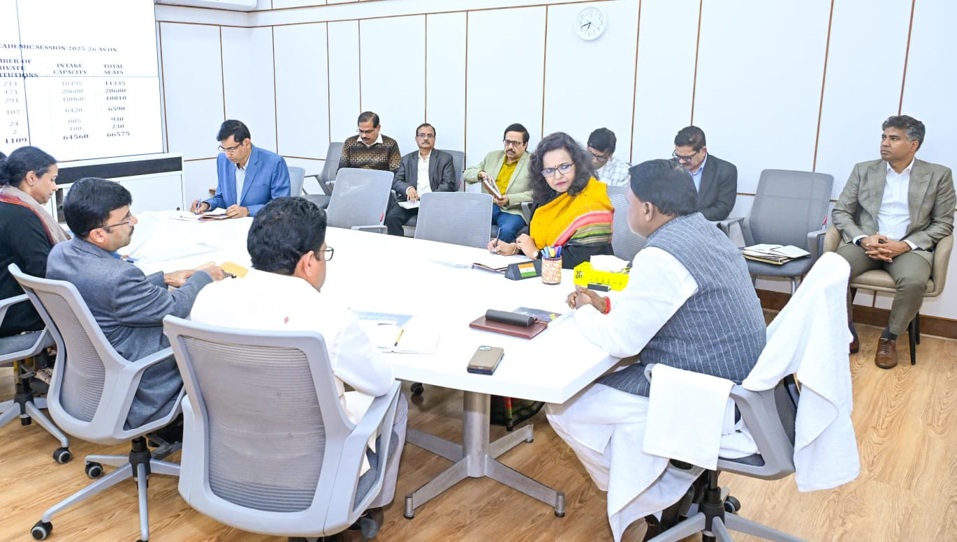 Government officials participating in a review meeting