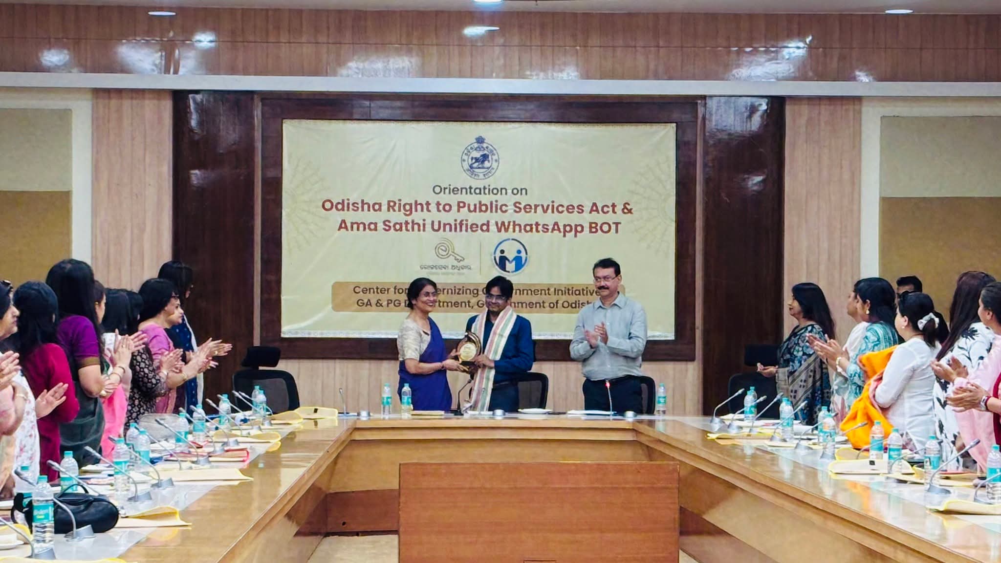 Award presentation during the Odisha Right to Public Services and Ama Sathi orientation